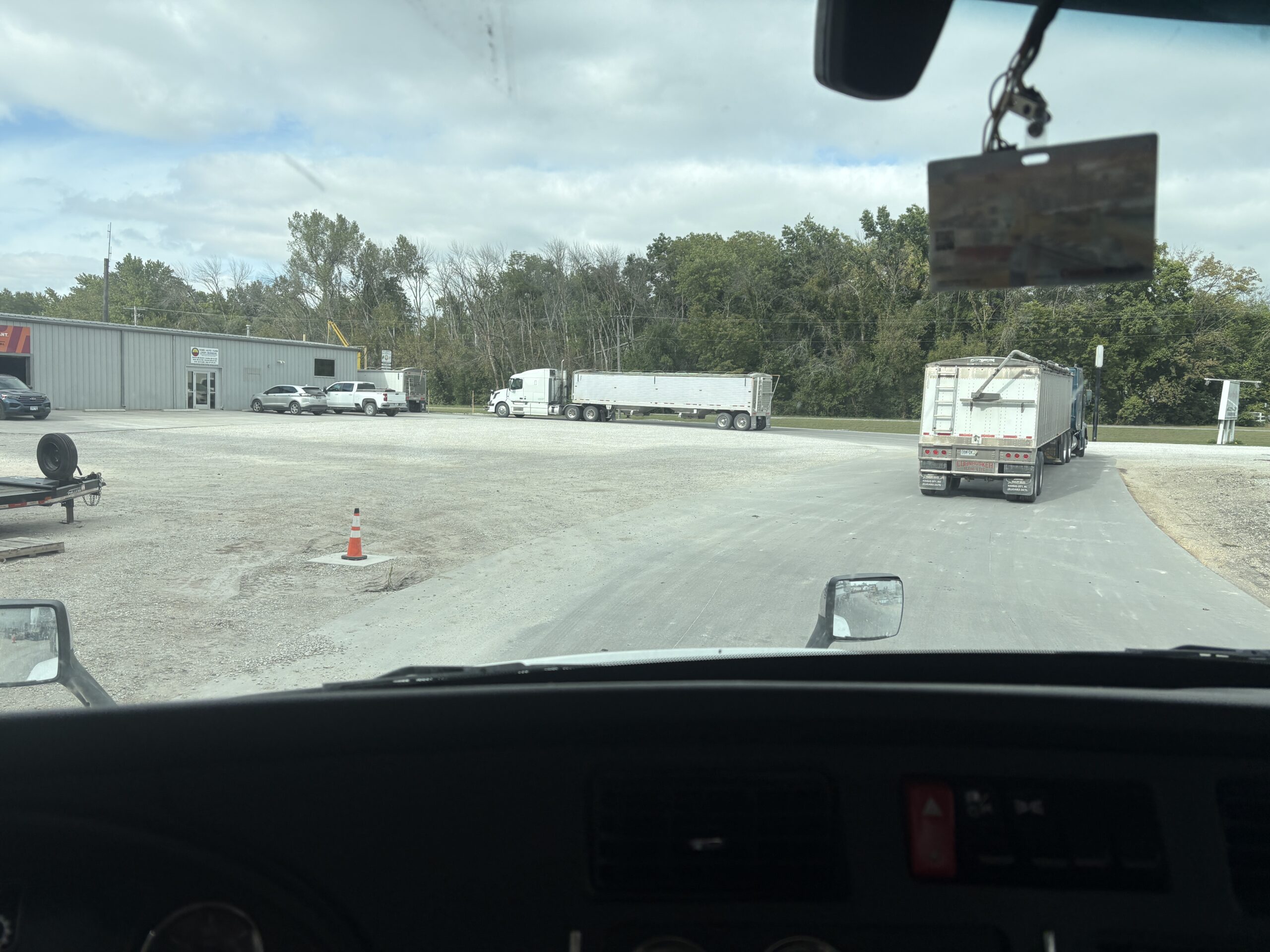 Line of trucking waiting to unload grain