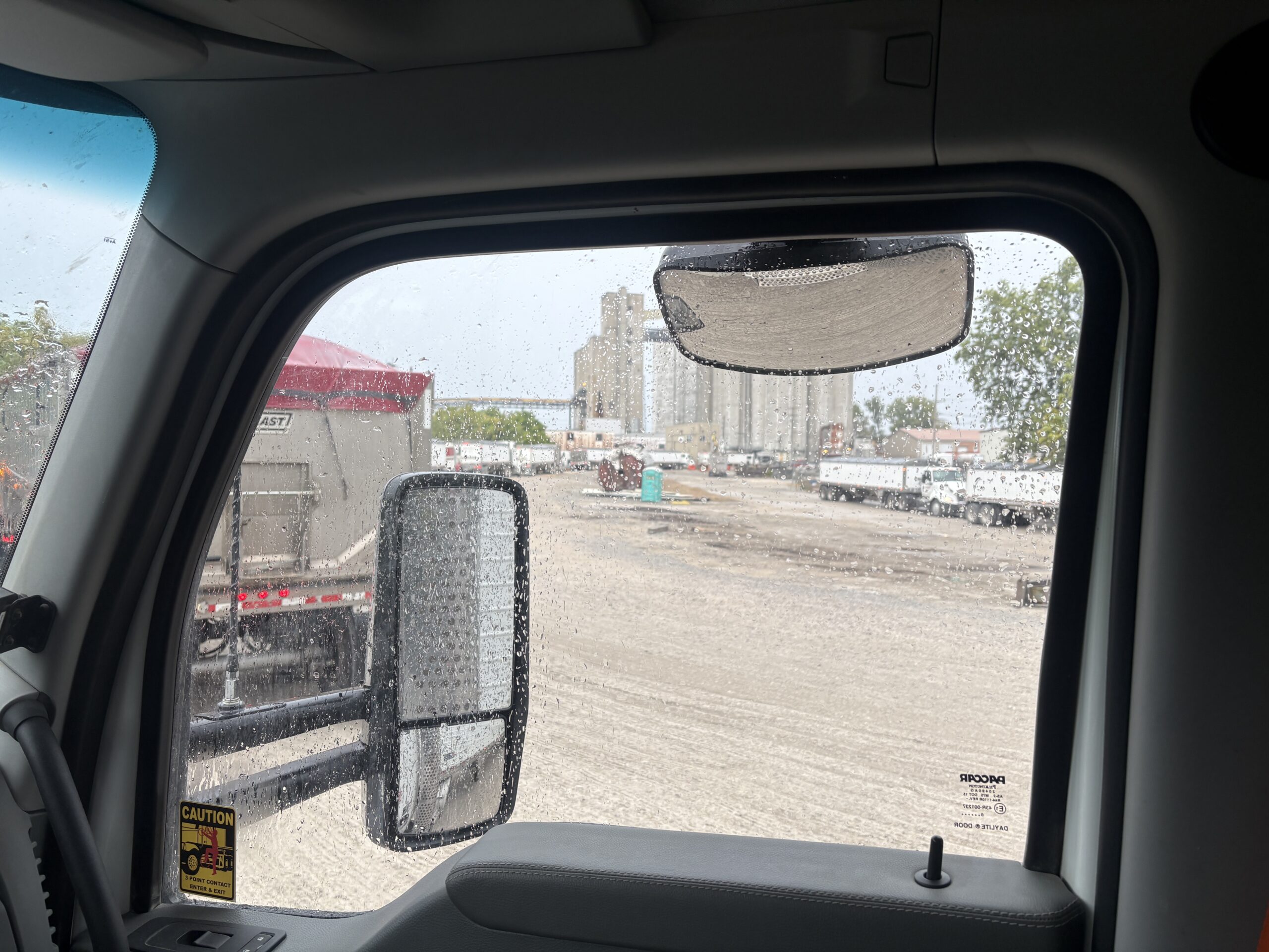 Long line of trucks hauling beans